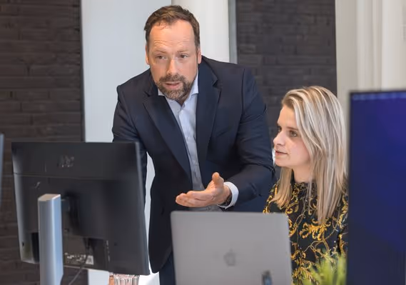 Aad working with Léan, the office manager and strategic advisor at Present Media